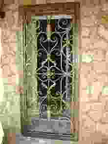 Кованая решетка на дверь 2