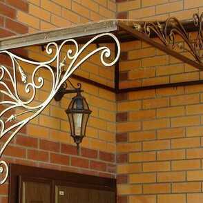 Угловой кованый козырек 61