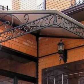 Угловой кованый козырек 70